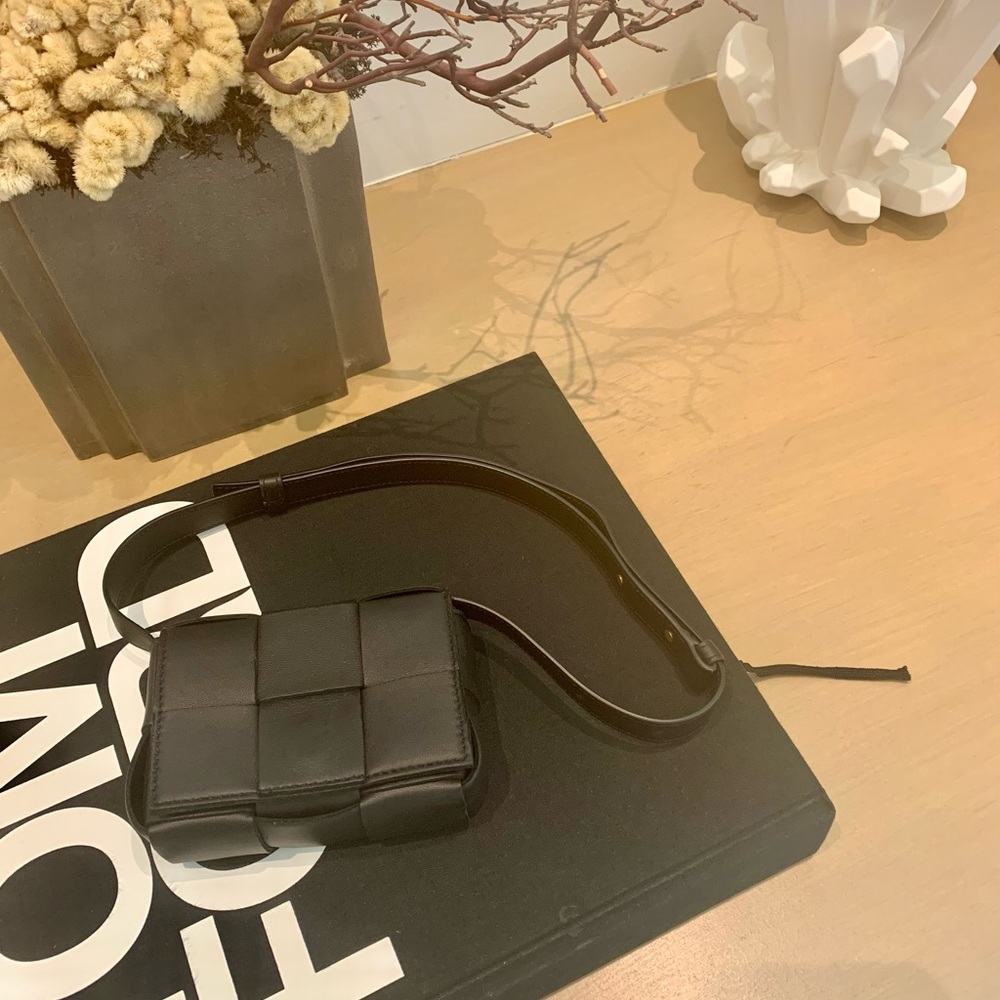BOTTEGA VENETA
Black Intrecciato 'The Mini Cassette' Bag